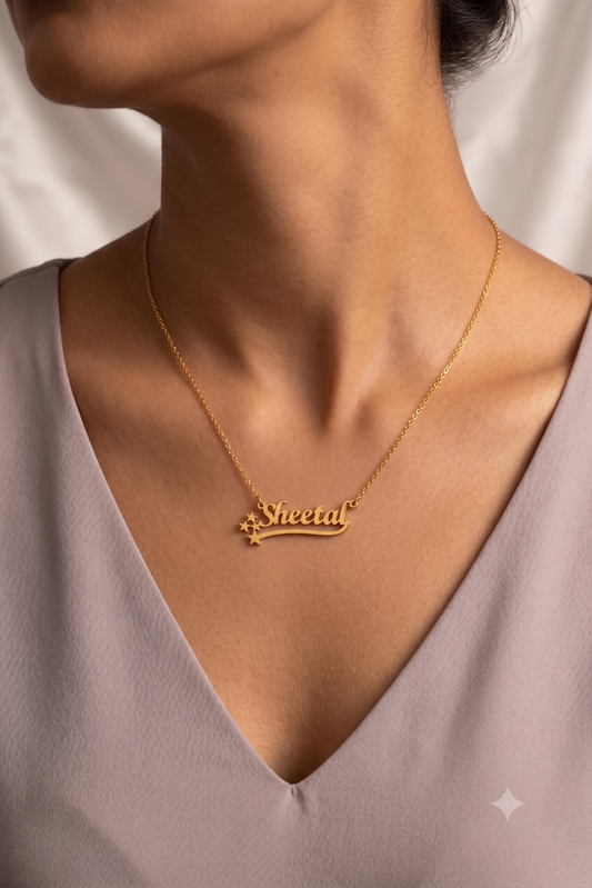 Star name necklace worn on model