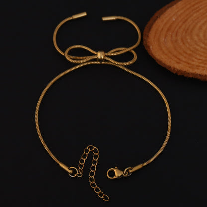 Golden Grace Bow Bracelet