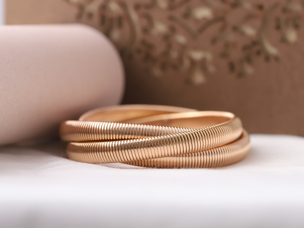 Elegant Gold-Toned Spiral Bangle Set