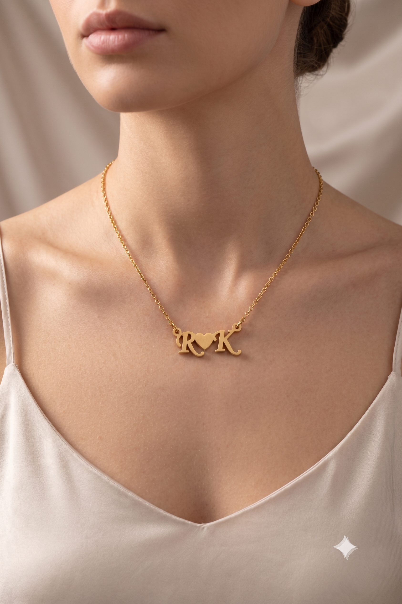 Couple initials heart necklace worn on model