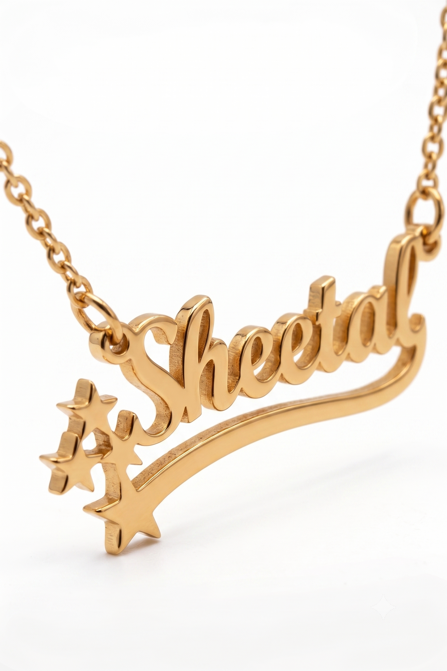 Close-up of star name pendant with stars